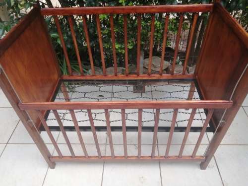 Lovely old solid wood cot.