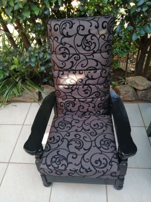 Beautiful pair of black high back arm chairs.