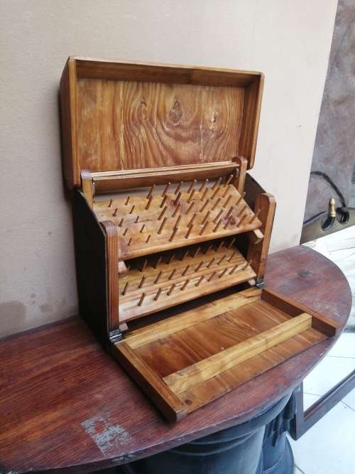 Awesome wooden cotton reel box.