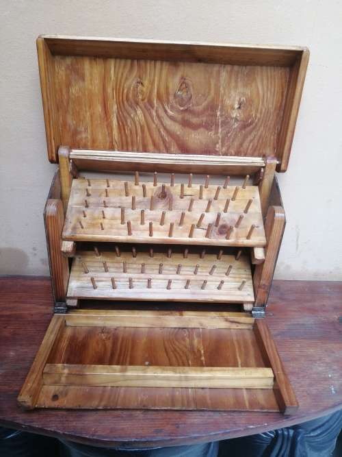 Awesome wooden cotton reel box.