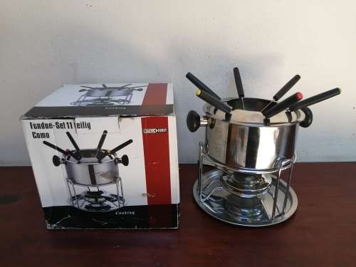 Lovely stainless steel fondue set.