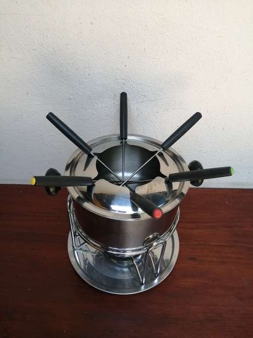 Lovely stainless steel fondue set.