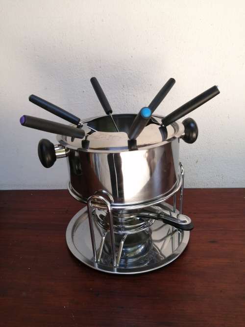 Lovely stainless steel fondue set.