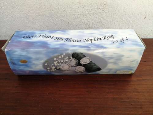 Beautiful set of 4 silver plated napkin rings.