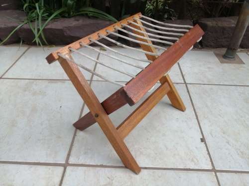Awesome old solid wood fold up fishing stool.