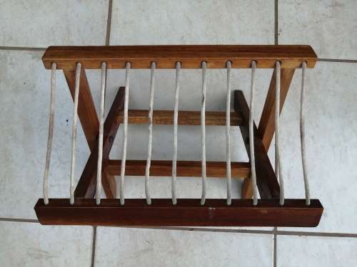 Awesome old solid wood fold up fishing stool.