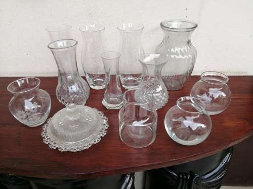 Lovely collection of glass vases, dishes and bowls.