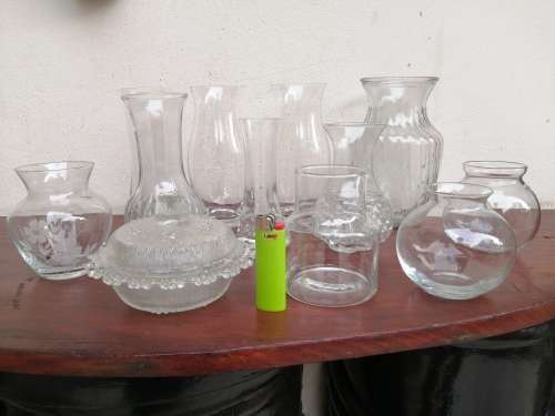 Lovely collection of glass vases, dishes and bowls.
