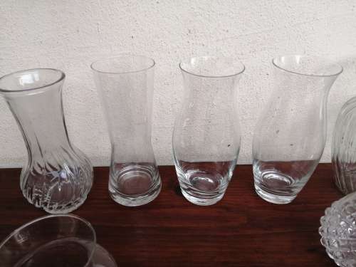 Lovely collection of glass vases, dishes and bowls.