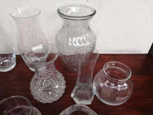 Lovely collection of glass vases, dishes and bowls.