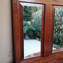 Beautiful, large solid oak mirror.