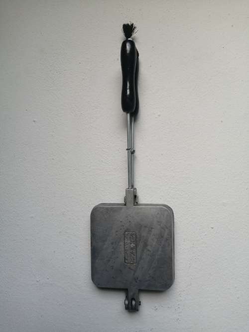 Awesome old hand held sandwich maker.