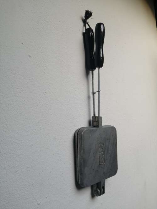 Awesome old hand held sandwich maker.