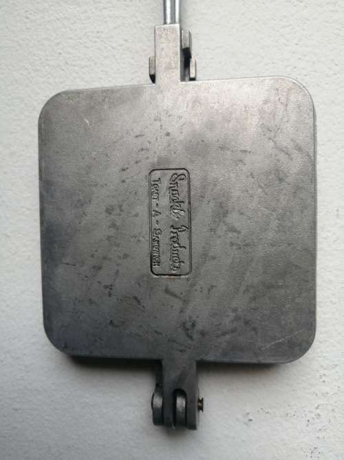 Awesome old hand held sandwich maker.