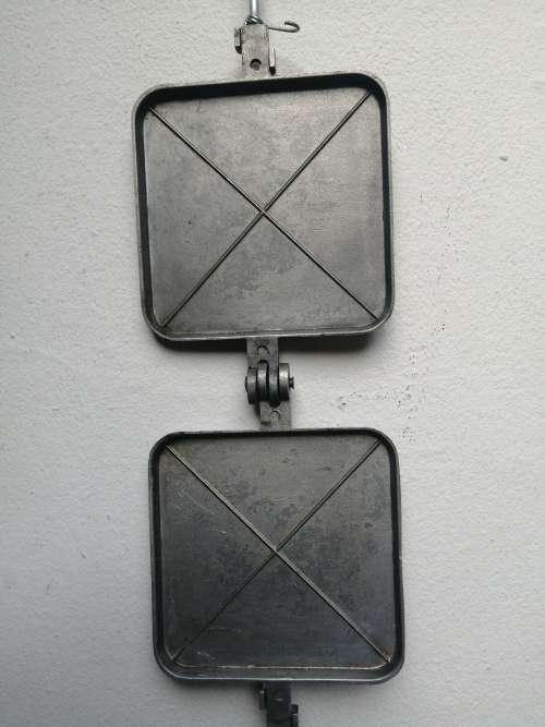 Awesome old hand held sandwich maker.