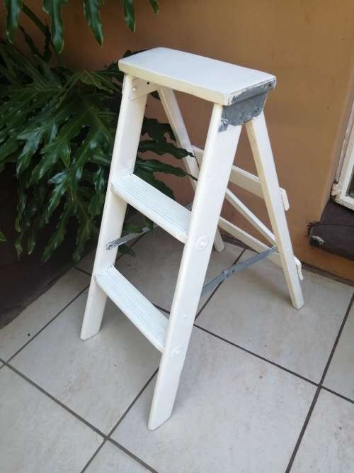 Handy old small wooden ladder.