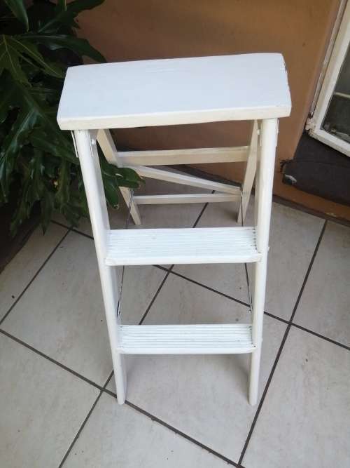 Handy old small wooden ladder.