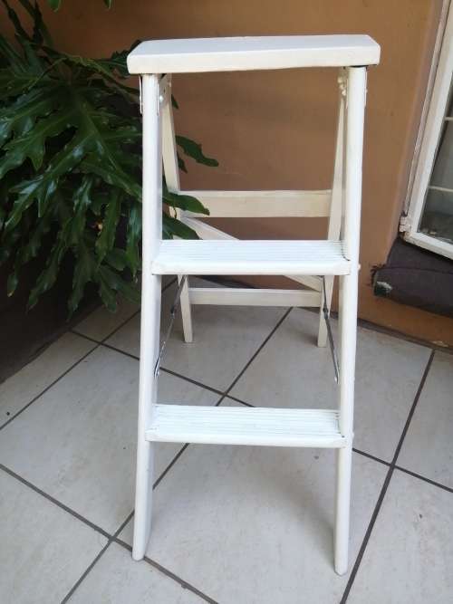 Handy old small wooden ladder.