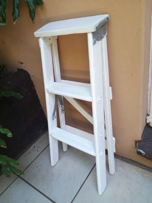 Handy old small wooden ladder.