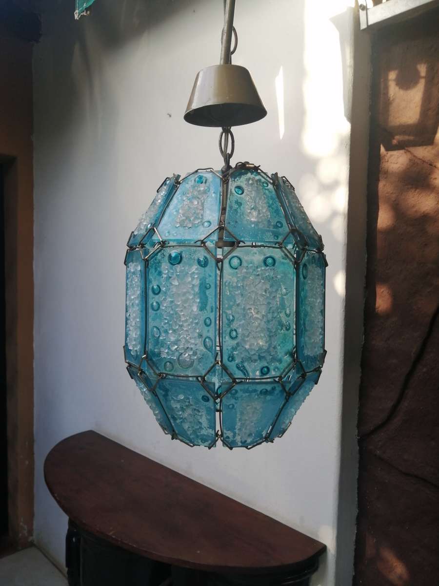 Beautiful frosted blue glass ceiling light.