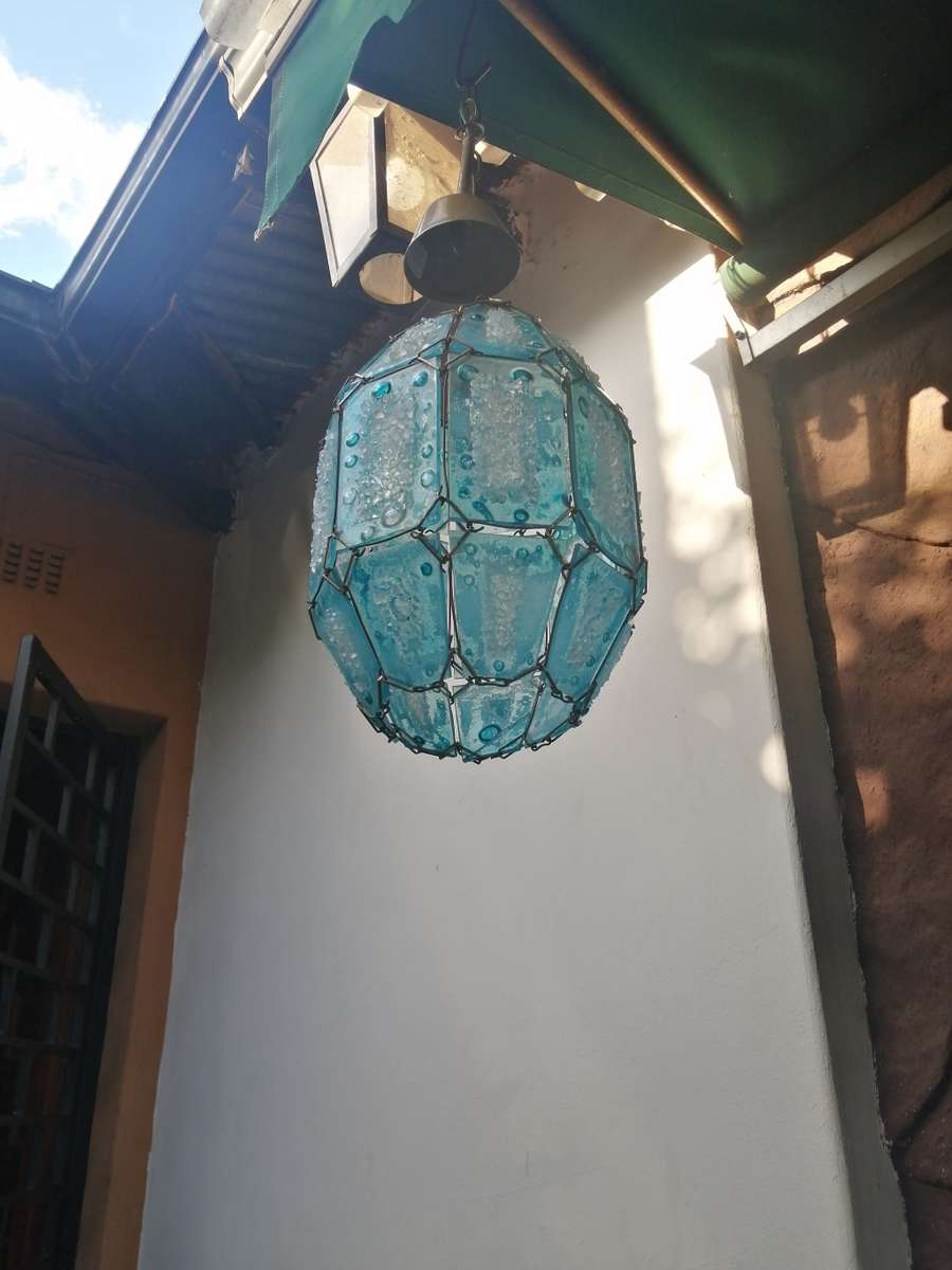 Beautiful frosted blue glass ceiling light.