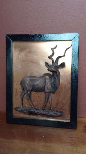 Copper buck wall hanging.