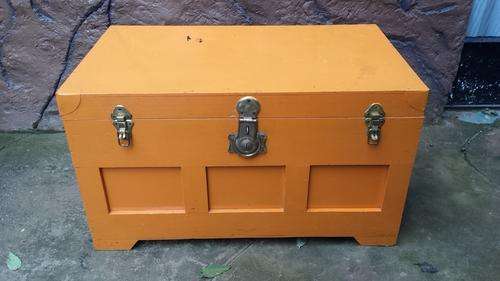 Large old orange chest.