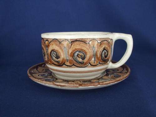Pottery Cup and Saucer