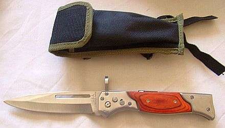 A DIFFERENT AK 47 BAYONET WITH POUCH