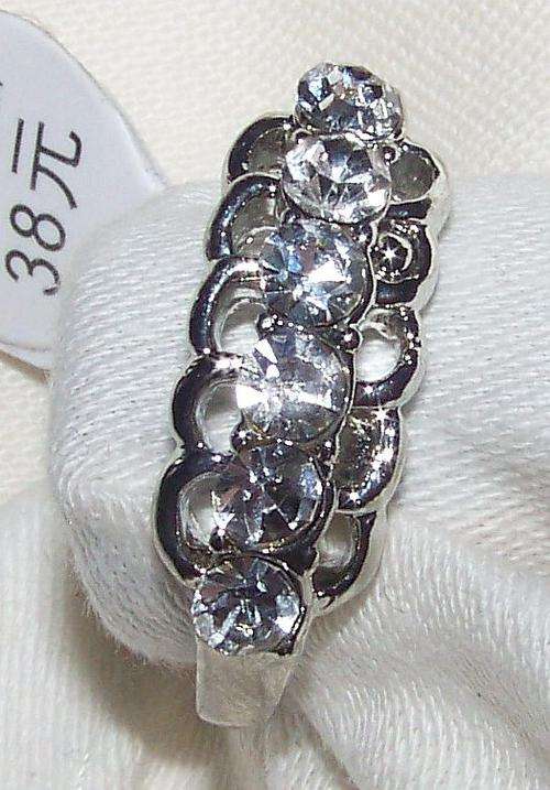 SILVER COSTUME RING WITH LOTS OF FAUX DIAMONDS