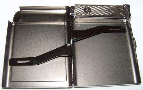 shop soiled silver cigarette case and lighter