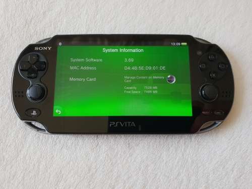Playstation Vita Wifi Console + 8 GB Memory card + Charger