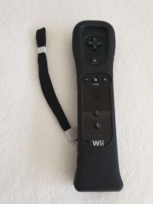 Nintendo Wii Console + 4 Games