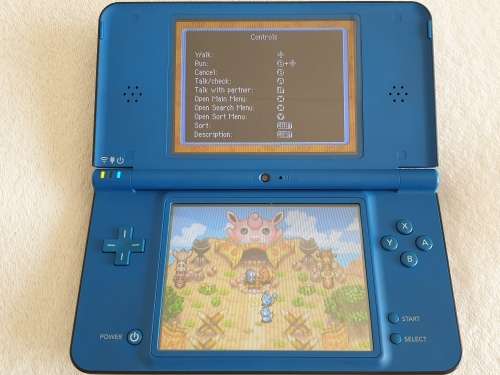 Nintendo DSi XL Console + 6 Games