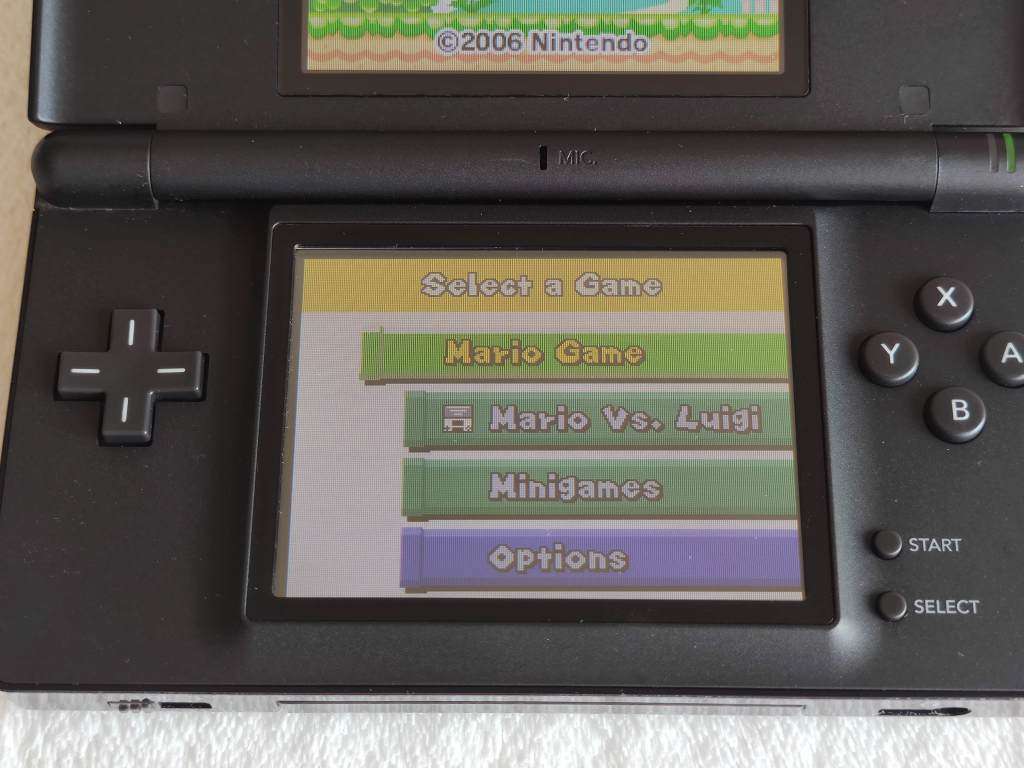 Nintendo DS Lite Console + New Super Mario Bros