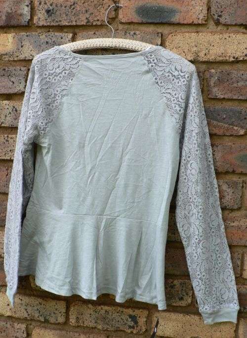 Woolworths light grey peplum top with long lacy sleeves - Size M