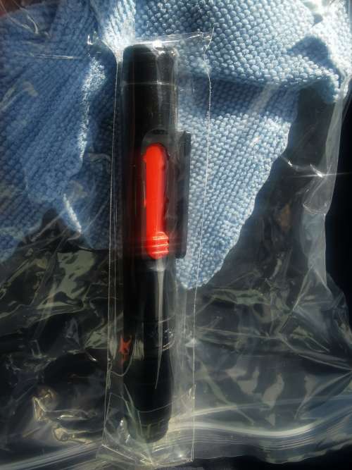 Lens cleaner and cloth