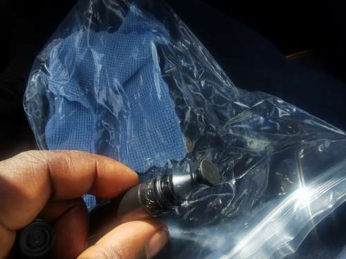 Lens cleaner and cloth