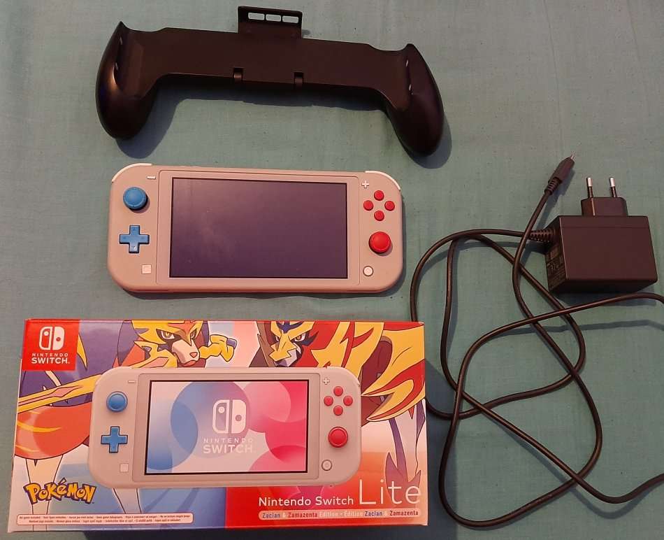 Nintendo Switch Light Pokemon console with extras , used