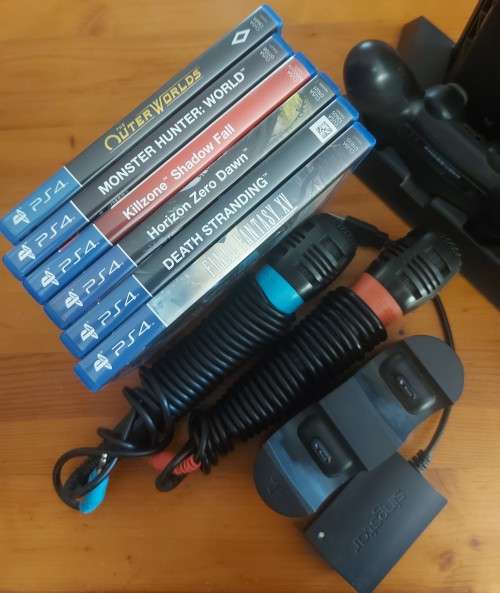 PlayStation 4 slim 500GB bundle with two controllers and six games , excellent condition