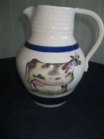 Large Stoneware Jug Decorated with a Cow