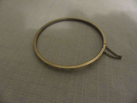 Vintage Gold Plated Hindged Bangle with Safety Chain.