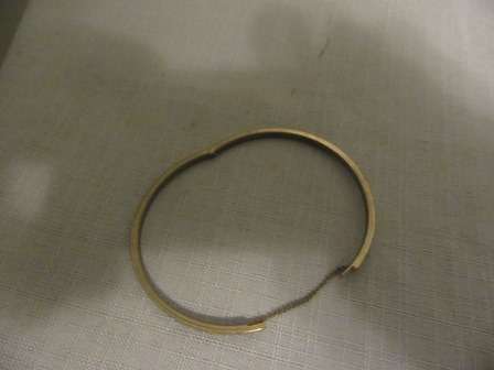 Vintage Gold Plated Hindged Bangle with Safety Chain.