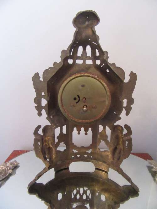 Ornate Brass Mantel  Clock with Cherubs.