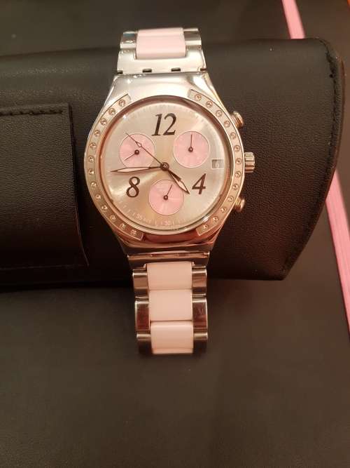 Ladies Swatch watch pink & stainless steel