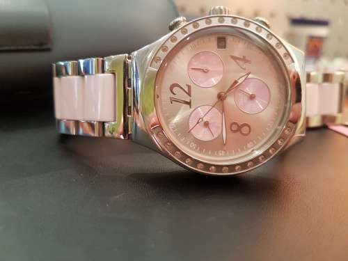 Ladies Swatch watch pink & stainless steel