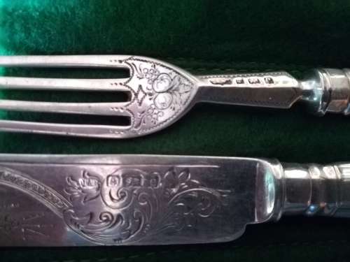 Set of 8 knives and forks with 4 spoons.
