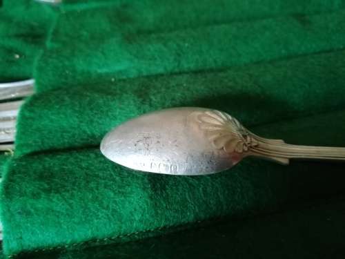 Set of 8 knives and forks with 4 spoons.