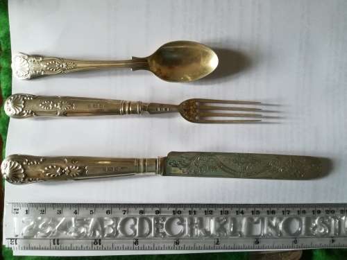 Set of 8 knives and forks with 4 spoons.