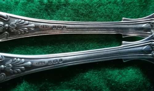 Sterling set of 12 knives and forks